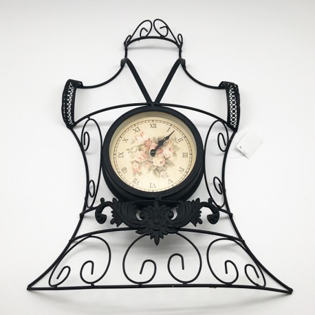 reloj metálico diseño maniquí